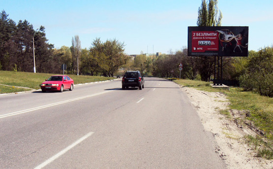 Фото рекламной плоскости по адресу Обухов ул.Киевская 10 (А)/рынок "Песчаный" выезд