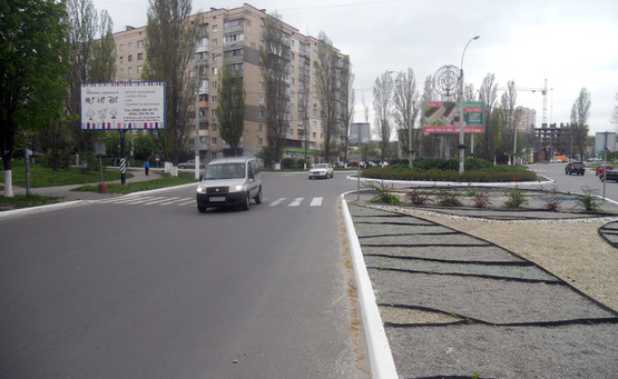 Фото рекламной плоскости по адресу Вышгород ул.Шолуденко,7/Мазепи/клумба (напр.на трассу Киев-Иванков) (В)