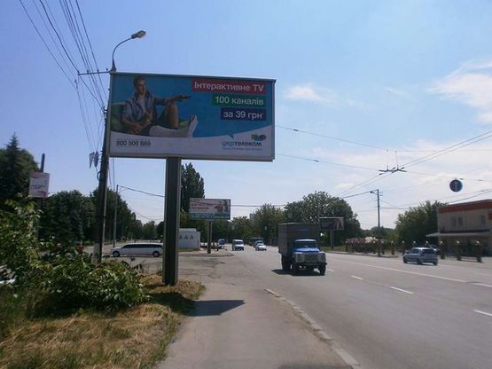 Фото рекламной плоскости по адресу Лебединского ул., 5 ( "БМ Банк", СТО, направление к гипермаркету "Грош")