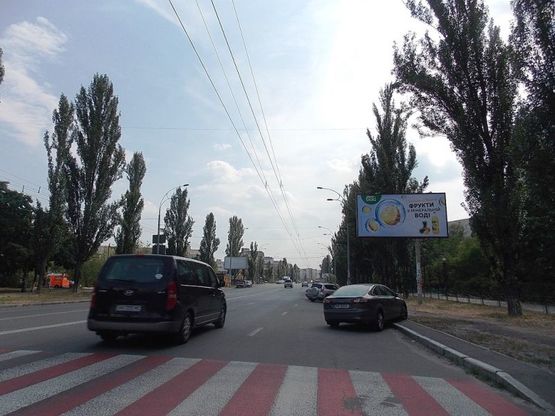 Фото рекламной плоскости по адресу М. Малиновского, 27/23, напр. от пр-кта Героев Сталинграда