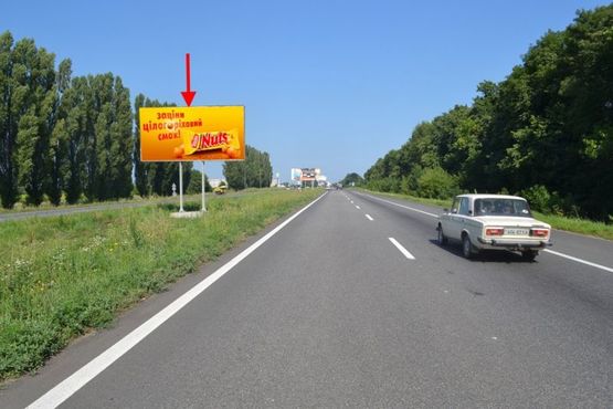 Фото рекламной плоскости по адресу Московский пр-т - Ростовская трасса возле поворота на Б. Рогань (въезд в город)