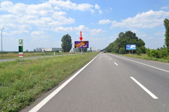 Фото рекламної площини за адресою Московский пр-т - Ростовская трасса возле АЗС ОККО 1(въезд в город)