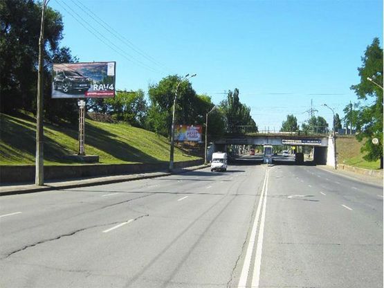 Фото рекламної площини за адресою Волгоградская ул., путепровод, дв-е к Поля пл.