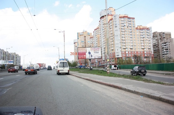 Фото рекламной плоскости по адресу Палладина 18/30 Крупная транспортная развязка, большое количество банков, офисов, магазинов. 600м., м. Академгородок