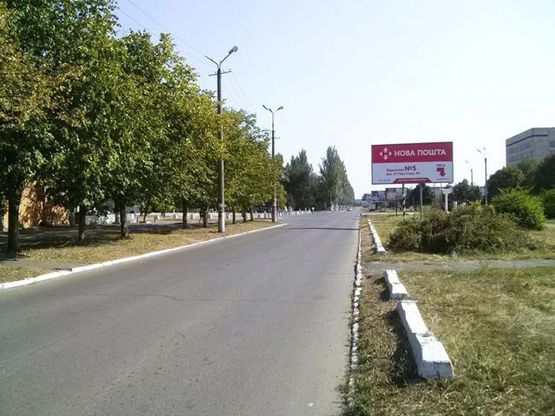 Фото рекламної площини за адресою Неделина ул.- Победы пр., 34, мкр. Ингулец Фото рекламної площини за адресою Неделина ул.- Победы пр., 34, мкр. Ингулец