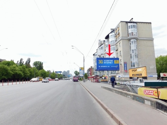 Фото рекламної площини за адресою Победы пр-т 94/1, возле супермаркет Фуршет,из центра