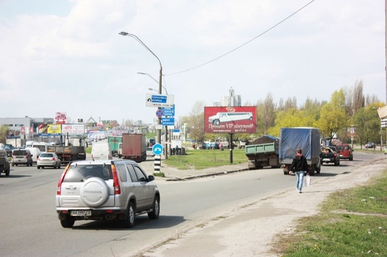 Фото рекламної площини за адресою Большая Окружная 1, крупная транспортная развязка, через дорогу Автозаз Дэу, в сторону пр-т., Победы, на развилке