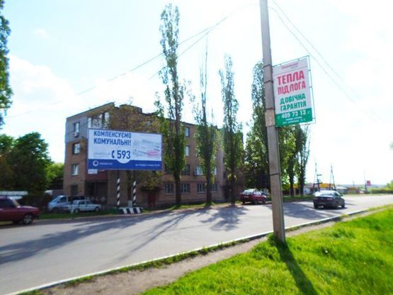 Фото рекламной плоскости по адресу Быкова ул., 33 (ТЦ “Эпицентр”), выезд со стоянки