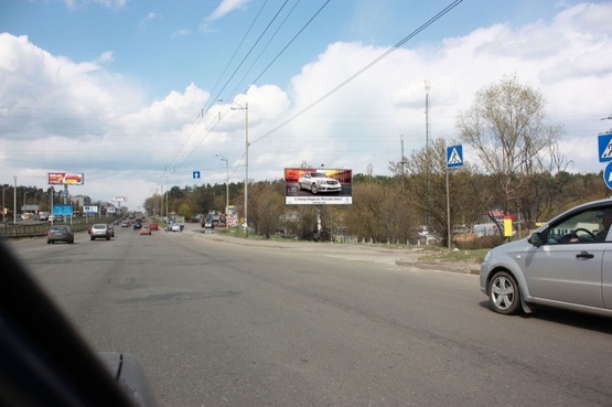 Фото рекламной плоскости по адресу Окружная дорога, крупная транспортная развязка, на перекрестке Окружной дороги и ул., Победы, в сторону пр-т., Победы