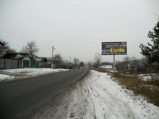 Фото рекламной плоскости по адресу с. Пуховка, вул. Ленина, напроти буд. №34 Фото рекламной плоскости по адресу с. Пуховка, вул. Ленина, напроти буд. №34