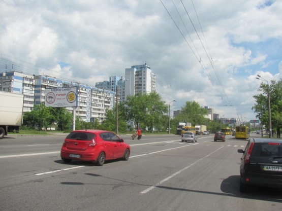 Фото рекламной плоскости по адресу Маяковского ул., 21, в сторону Драйзера ул. (Watsons, ЕКО-маркет, Эльдорадо, рынок, автомойка)