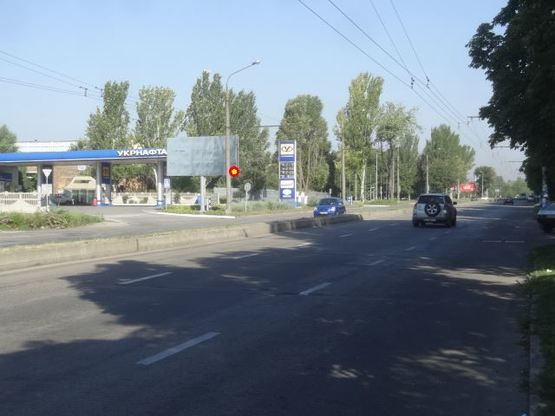 Фото рекламної площини за адресою вул.Перемоги - Вознесенівський ринок, АЗС "ТНК", ст.Б