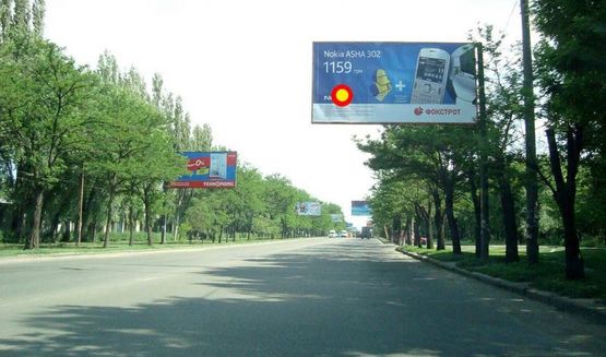 Фото рекламной плоскости по адресу пр.Богоявленский, 43 (Офис Энергобанка) Г-образный щит над дорогой, стА