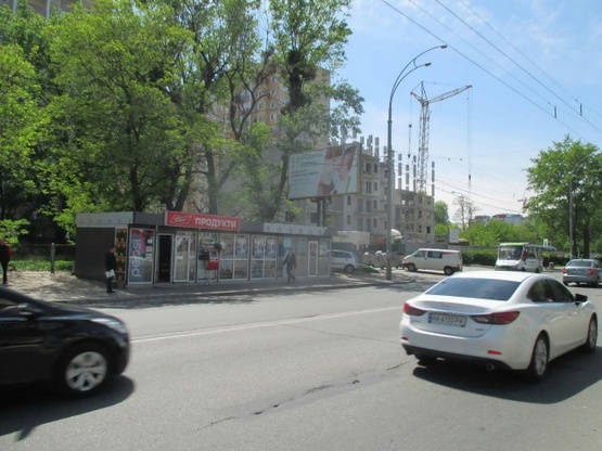 Фото рекламной плоскости по адресу ул.О.Трутенко,7 (к Окружной дороге, суперм.Метро и Эпицентр)