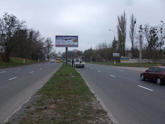 Фото рекламной плоскости по адресу ул. Киевская (Водоканал) разделитель 2 въезд Фото рекламной плоскости по адресу ул. Киевская (Водоканал) разделитель 2 въезд