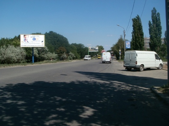 Фото рекламной плоскости по адресу ул. Троицкая, поворот на санаторий "Дубки"