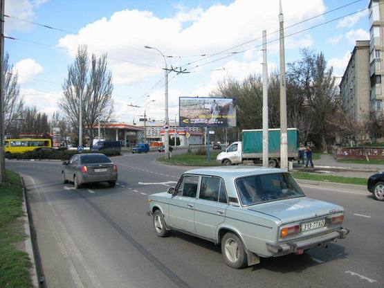 Фото рекламної площини за адресою пл.  200 лет Херсона / ул.Полковника Кедровского(Буденного) Фото рекламної площини за адресою пл.  200 лет Херсона / ул.Полковника Кедровского(Буденного)