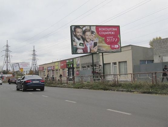 Фото рекламної площини за адресою Космонавта Попова ул., 15/18 (напротив)