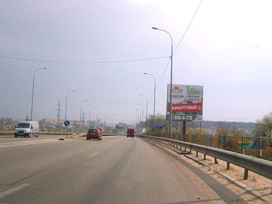 Фото рекламной плоскости по адресу Трасса Киев-Ковель (слева), направление на Киев, на мосту Фото рекламной плоскости по адресу Трасса Киев-Ковель (слева), направление на Киев, на мосту