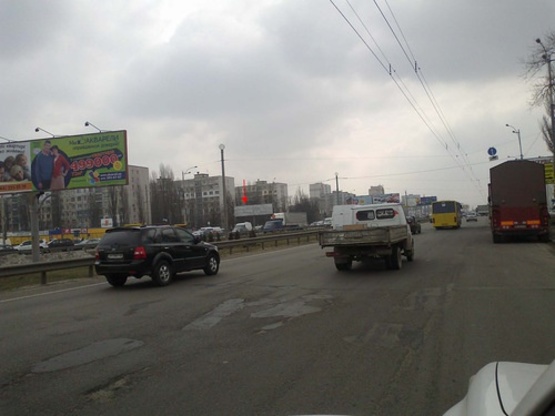 Фото рекламної площини за адресою Большая Кольцевая-ул.Тулузы перед Борщаговским рынком.левая Фото рекламної площини за адресою Большая Кольцевая-ул.Тулузы перед Борщаговским рынком.левая