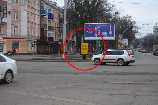 Фото рекламной плоскости по адресу вул. Соборності (Жовтнева),46 -п.перехід