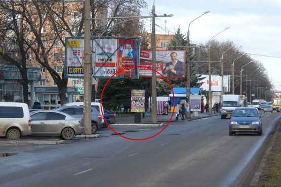 Фото рекламной плоскости по адресу вул. Соборності (Жовтнева)/вул. С.Петлюри