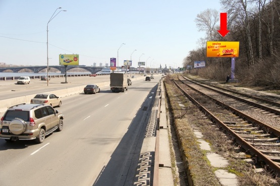 Фото рекламной плоскости по адресу Набережное шоссе, ст. м. "Днепр", в сторону моста Патона Фото рекламной плоскости по адресу Набережное шоссе, ст. м. "Днепр", в сторону моста Патона