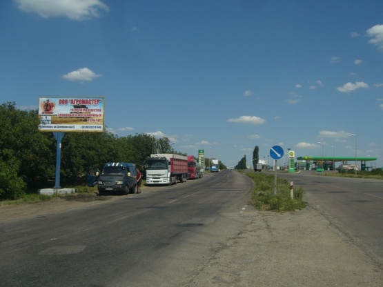 Фото рекламной плоскости по адресу Баштанское шоссе - АЗС, въезд Фото рекламной плоскости по адресу Баштанское шоссе - АЗС, въезд