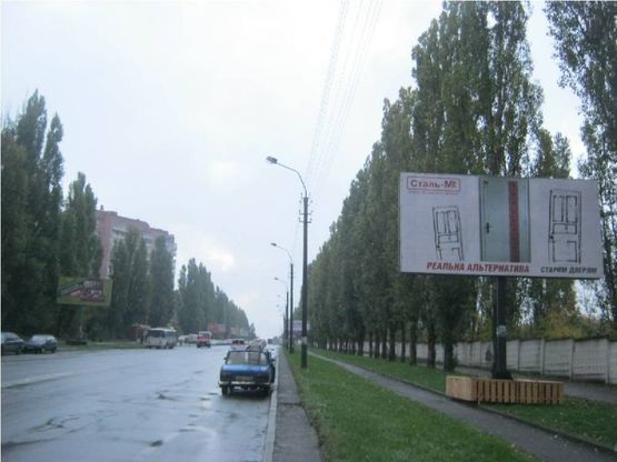 Фото рекламної площини за адресою вул. Шухевича 12, неподалік автозаправки "OKKO" Фото рекламної площини за адресою вул. Шухевича 12, неподалік автозаправки "OKKO"