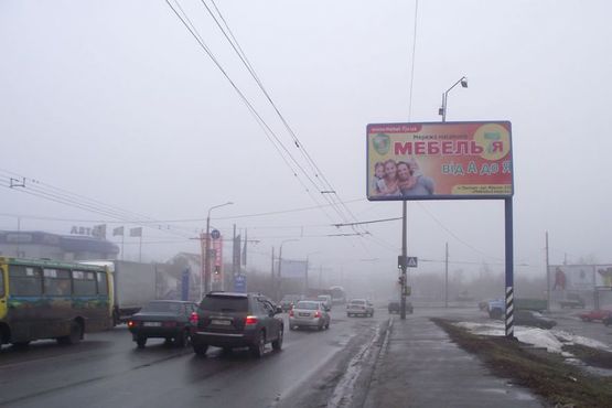 Фото рекламной плоскости по адресу вул. В.Тирновська / вул.Ковпака(шляхопровид)