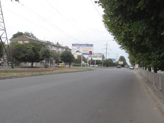 Фото рекламної площини за адресою пр.Кирова - ул.Вакуленчука, призматрон в центр Фото рекламної площини за адресою пр.Кирова - ул.Вакуленчука, призматрон в центр