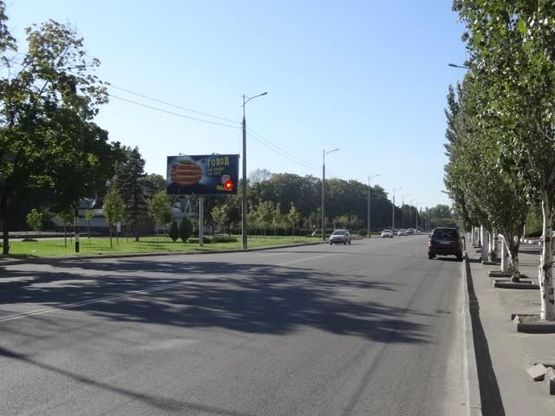 Фото рекламної площини за адресою Малиновского ул., 6, в центр