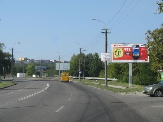 Фото рекламной плоскости по адресу Космическая ул., областная детская больница, в центр