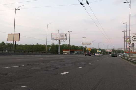 Фото рекламної площини за адресою Шухевича Романа просп. (Генерала Ватутіна просп.), : парк Дружби народів; Московський міст (в напр. Троєщини)