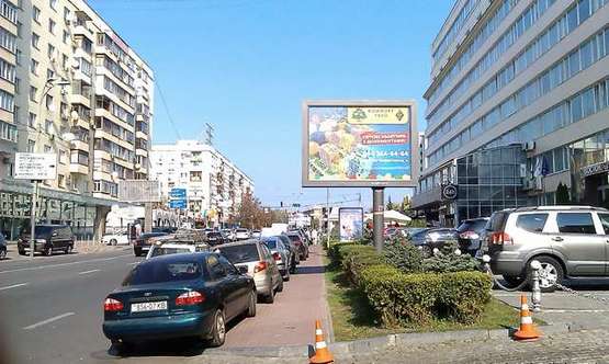 Фото рекламної площини за адресою Лесі Українки бульв., 26 - Коновальця Євгена вул. (Щорса вул.) ((№3) в центр) Фото рекламної площини за адресою Лесі Українки бульв., 26 - Коновальця Євгена вул. (Щорса вул.) ((№3) в центр)