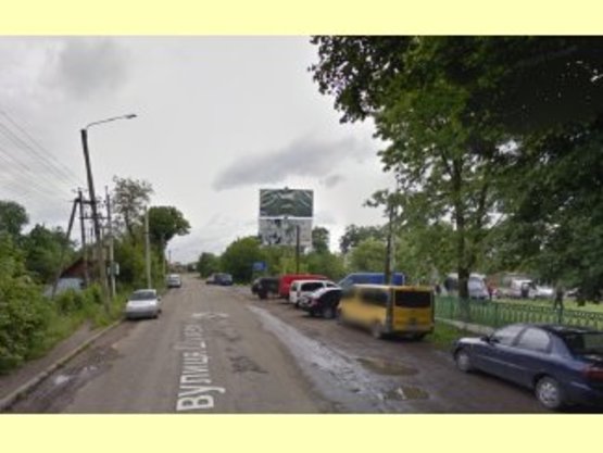 Фото рекламной плоскости по адресу вул.Шухевича(біля Торговиці) верхній