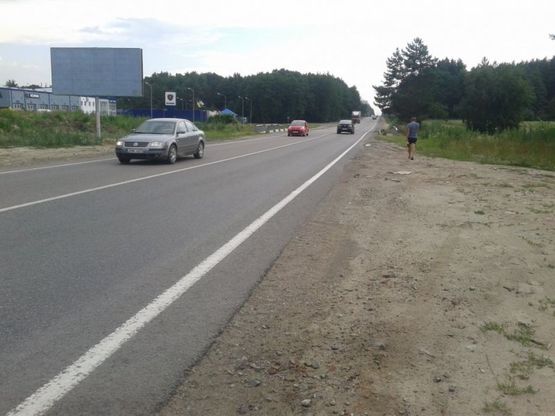 Фото рекламной плоскости по адресу М-10, Західний обхід м.Львова, км 0+400, Фуджікура Аутомотів, Сканія Львів, ліворуч