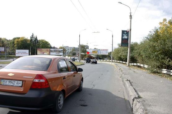 Фото рекламної площини за адресою розв'язка вул.Кам'янецька - вул.Толстого - Львівське шосе. (від центру, на ринки) Фото рекламної площини за адресою розв'язка вул.Кам'янецька - вул.Толстого - Львівське шосе. (від центру, на ринки)