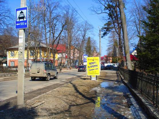 Фото рекламной плоскости по адресу Траса Н-09 Мукачево-Львів, Свободи, міський ринок, автозупинка, санаторій Прикарпатський, пішохідна зона до водоспаду Пробій, напрямок руху на Івано-Франківськ