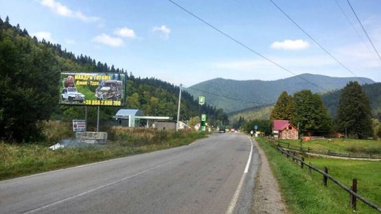 Фото рекламної площини за адресою Траса Н-09 Мукачево-Львів, виїзд з села, напрямок руху на Івано-Франківськ