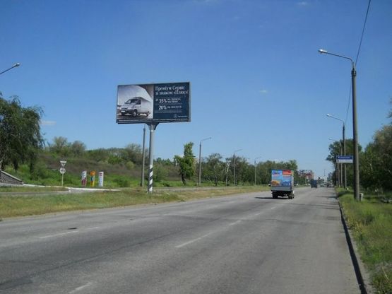 Фото рекламной плоскости по адресу Набережна магістраль - Вознесенівський ринок (автомойка «Кристалл»), напрямок руху до вокзалу