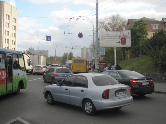 Фото рекламной плоскости по адресу Гетьмана Вадима ул. - Борщаговская ул. (Индустриальный мост, "Бабай Паб", "Very Well Cafe", ЭКО-маркет, направ. Караваевых Дач)