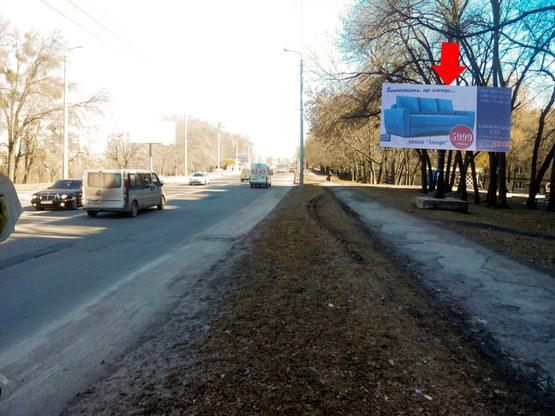 Фото рекламной плоскости по адресу Львовское шоссе, 47, возле вещевого рынка
