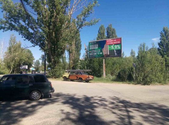 Фото рекламной плоскости по адресу ул. Шолуденко , з-д "Карат" ,пожарная часть направление в Вышгород , въезд с трассы Киев-Овруч Фото рекламной плоскости по адресу ул. Шолуденко , з-д "Карат" ,пожарная часть направление в Вышгород , въезд с трассы Киев-Овруч