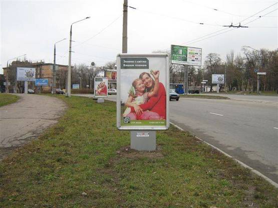 Фото рекламной плоскости по адресу пл. Ленина / въезд на ДнепроГЭС с левого берега Фото рекламной плоскости по адресу пл. Ленина / въезд на ДнепроГЭС с левого берега