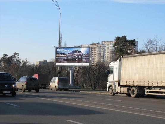 Фото рекламної площини за адресою Броварской просп. (ст. м.  Лесная, парк Киото, Автостанция Дарица) по направлению в город