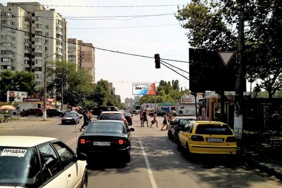 Фото рекламной плоскости по адресу ул. Бочарова / ул. Добровольского (рынок "Северный")