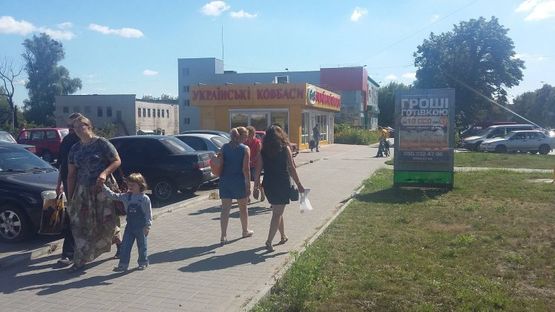 Фото рекламной плоскости по адресу перекресток ул. Шевченко-ул. Черкасскасская, магазина "АТБ"