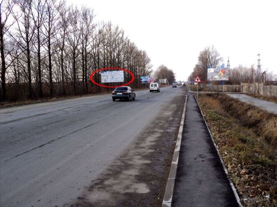 Фото рекламної площини за адресою Калуське шосе (виїзд з міста, АЗС WOG), напрямок руху зі сторони вул.Галицька в напрямку м.Калуш