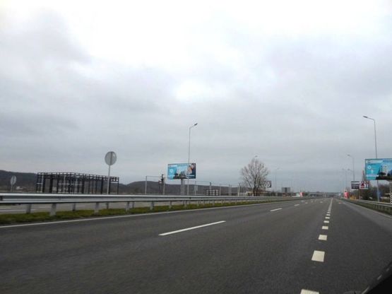 Фото рекламной плоскости по адресу Новообухівська траса, возле ресторана "Танжер", км 25+700 праворуч